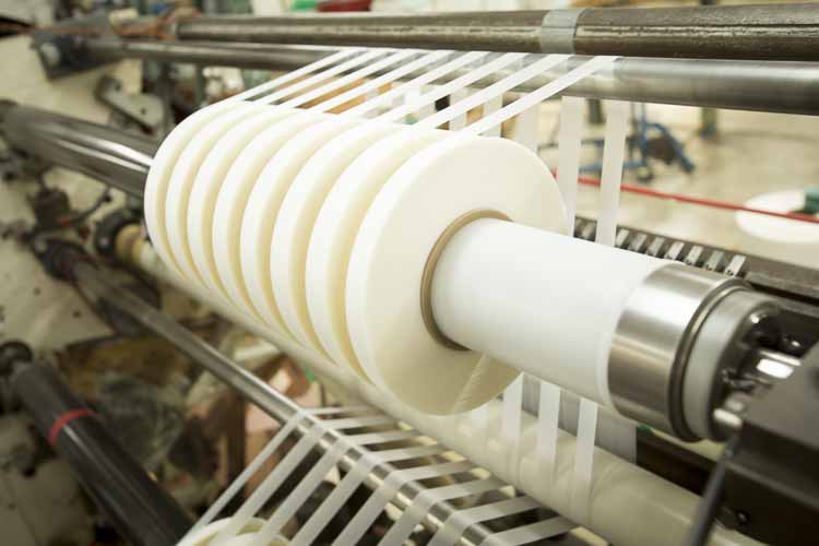 Lathe Slitting, Rewind Slitting, flexible materials and adhesives